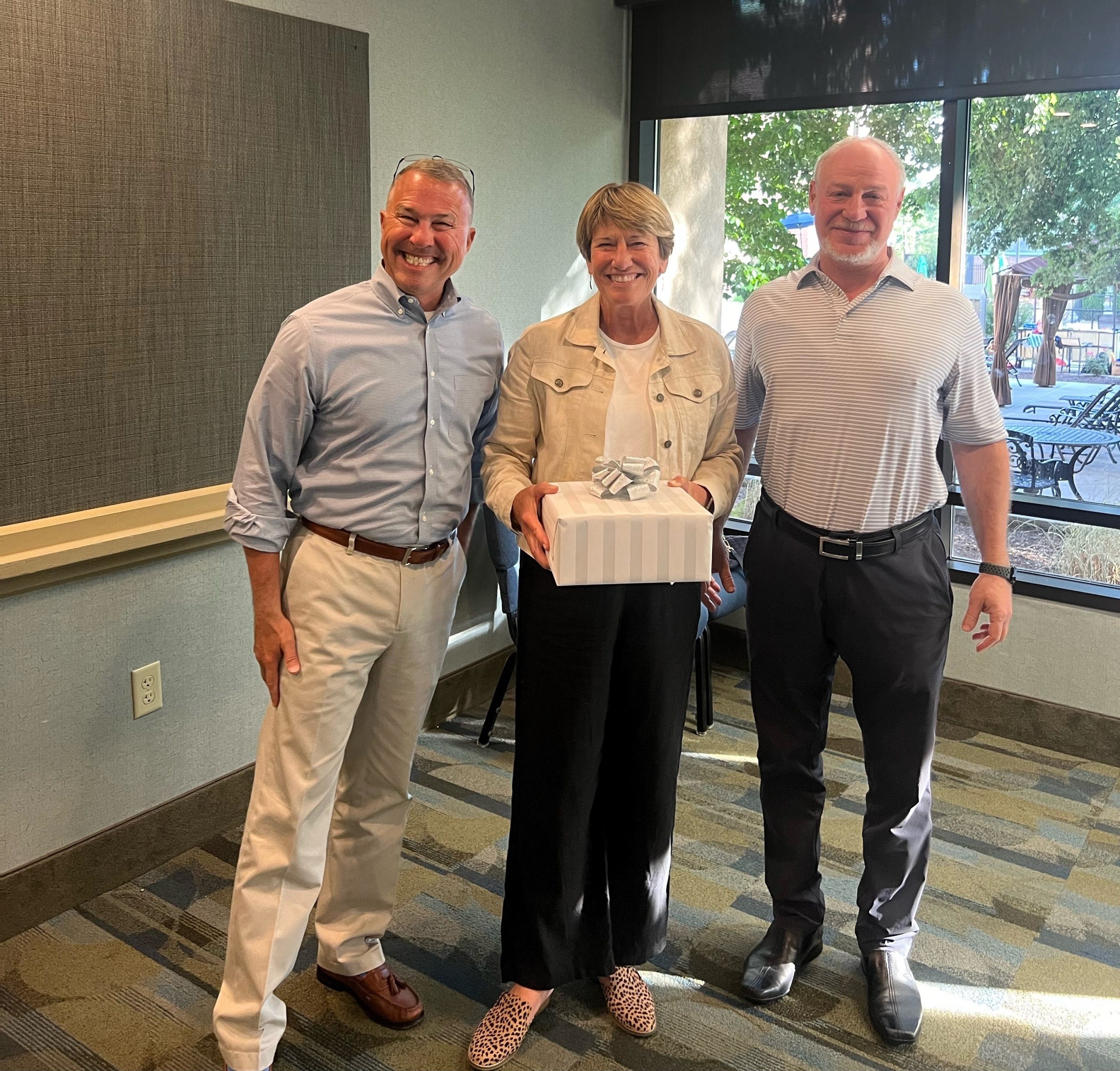 John Dumas, President and CEO, and Vlady Gorny, Chairman of the Board, thank Jody Lutrell for her seven years of service on the Board of Directors.